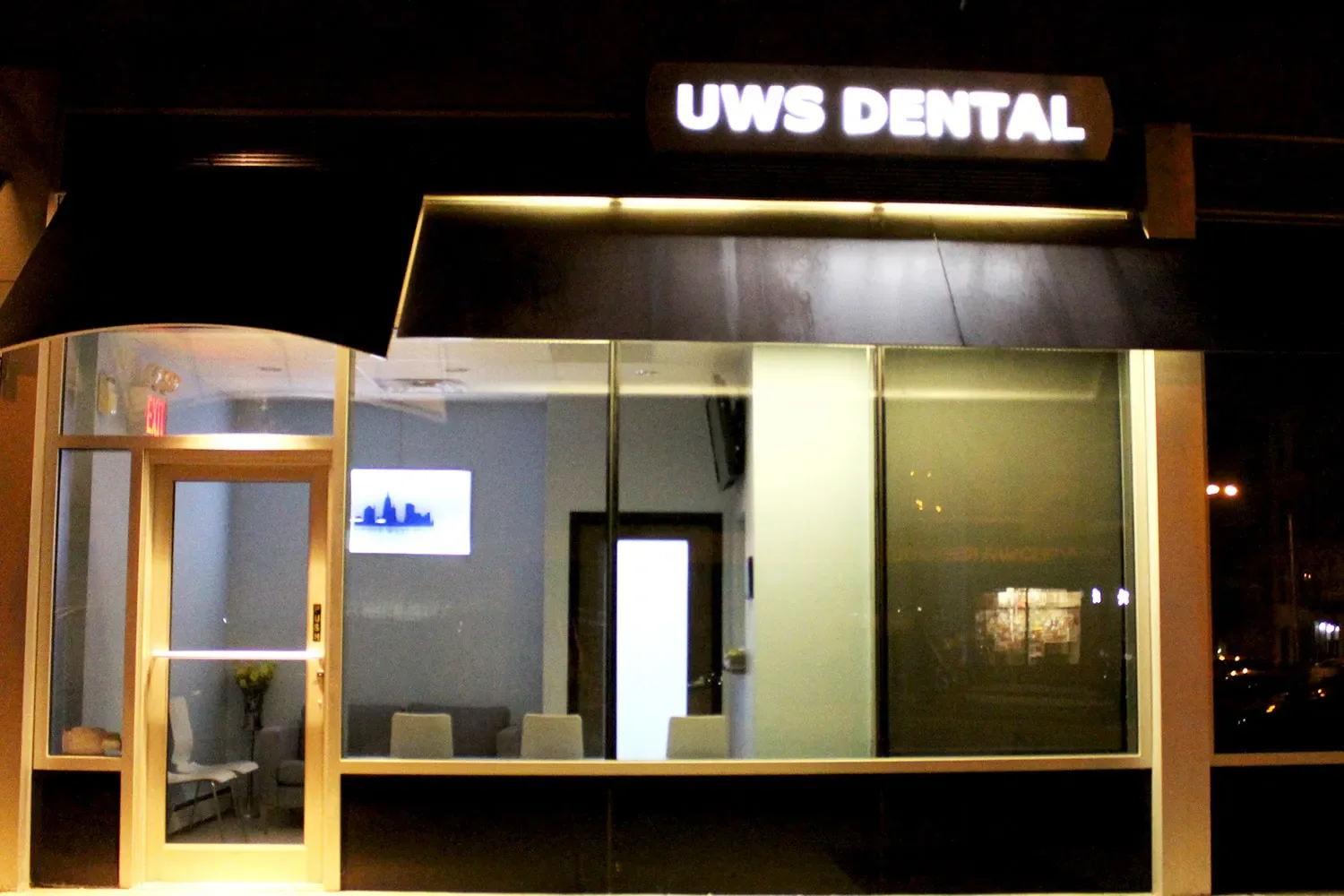 The storefront at dusk
